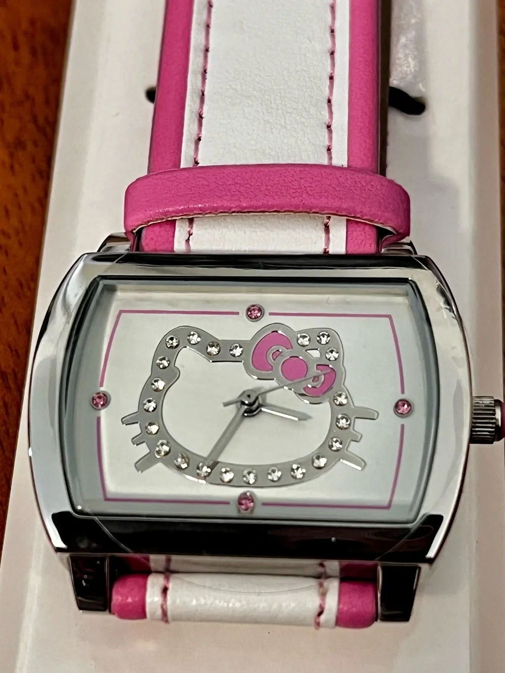 Brand New Hello Kitty Pink and White Women's Watch with rhinestone face.